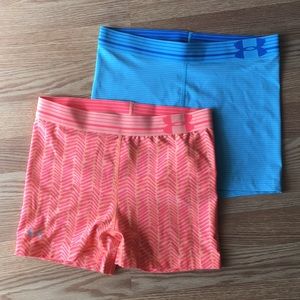 Two Under Armour compression shorts